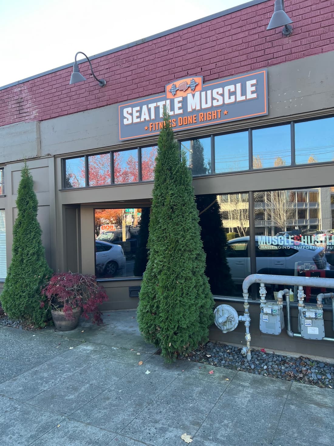 Seattle Muscle storefront on Nickerson Street, Seattle, with the Fitness Done Right sign above the windows